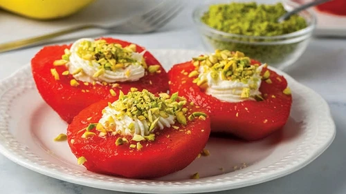 Quince Accompanied by Walnuts and Cream